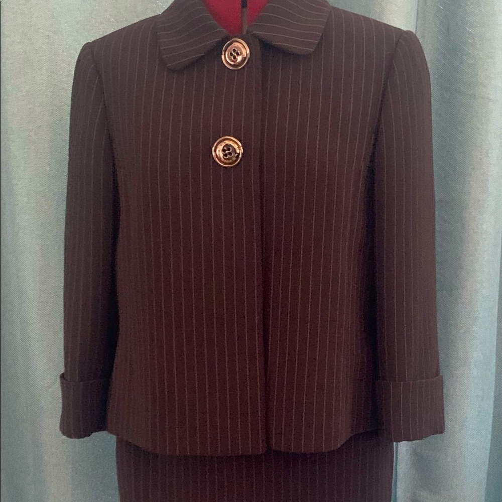 Sleek Tahari by Arthur S. Levine skirt suit in black with gray pinstripes.
